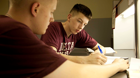 Cadets studying together at MMA